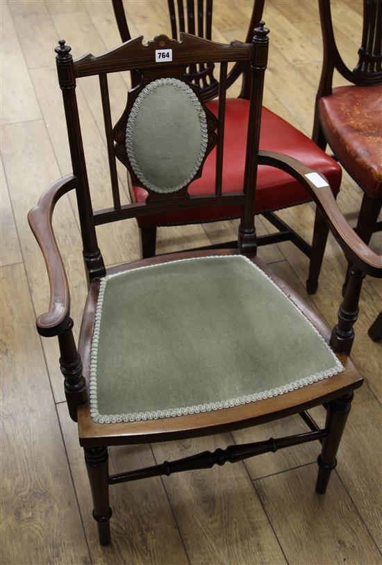 An inlaid elbow chair